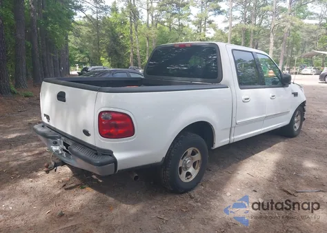 2003 Ford F-150 Lariat/Xlt z USA, uszkodzony, nr VIN 1FTRW07663KD69809